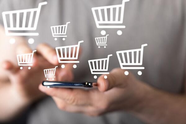 Illustration Mann mit Handy shoppt online